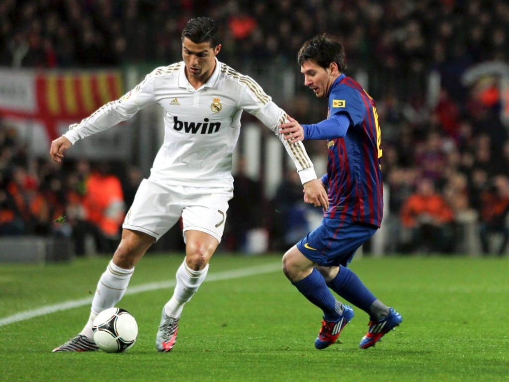 Cristiano y Messi en un clásico español